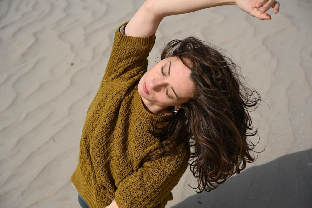 profile image of Anastasiia Bezruchko dancing on sand